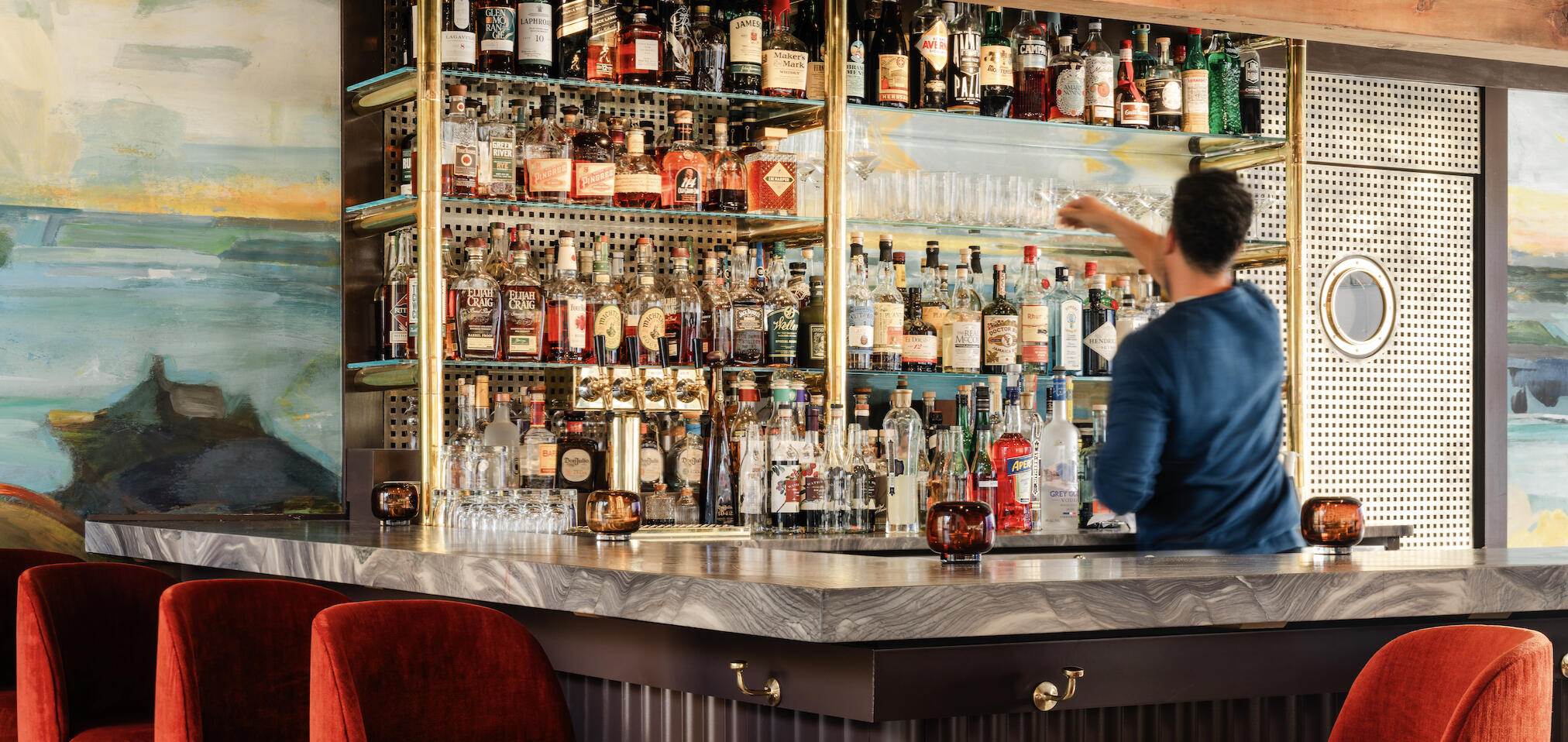custom brass bar shelving at Otis Lounge in Harbor Springs, Michigan