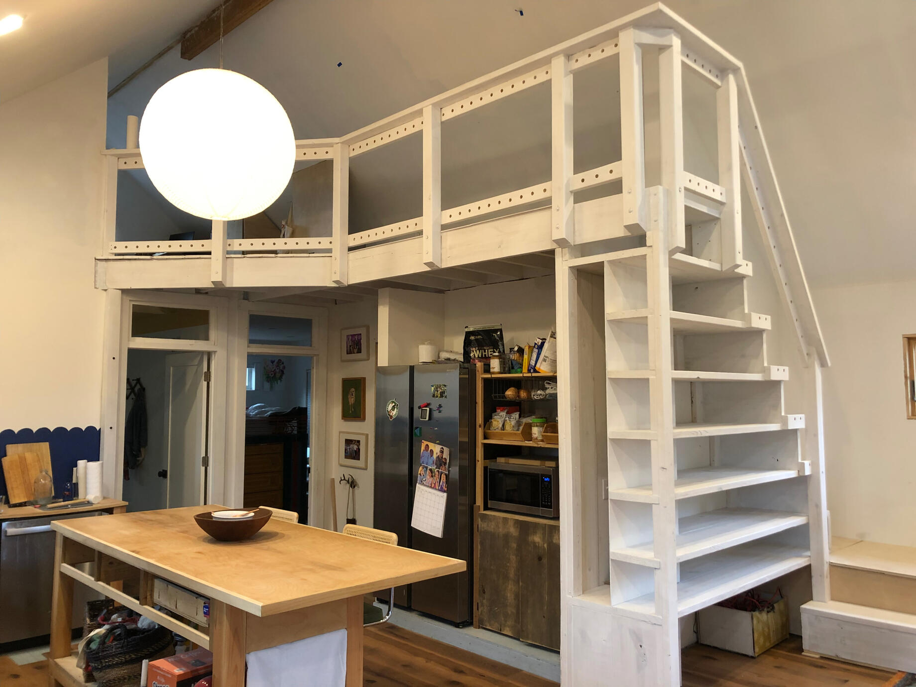 Loft with bookcase stairs in Evanston